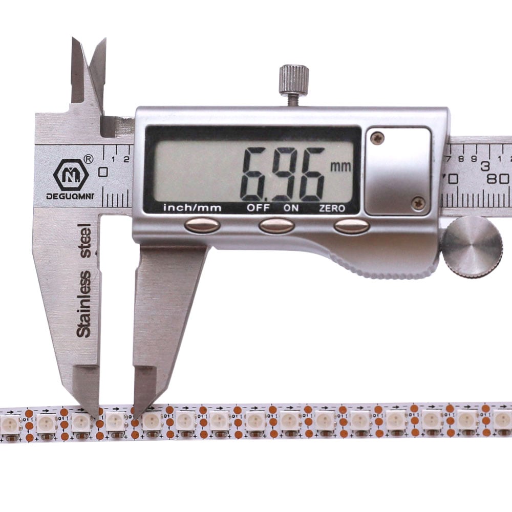 Close-up of illuminated LED strip on dark surface